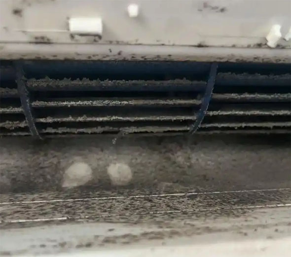 固阳空调吹的风有股烧焦味是怎么回事